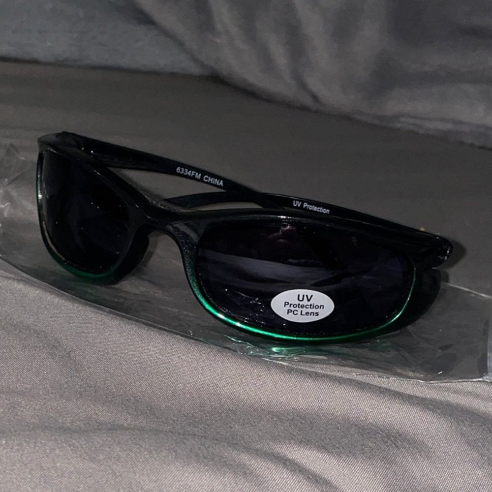 Sleek Black Sunglasses with Metallic Green Temples & Arms